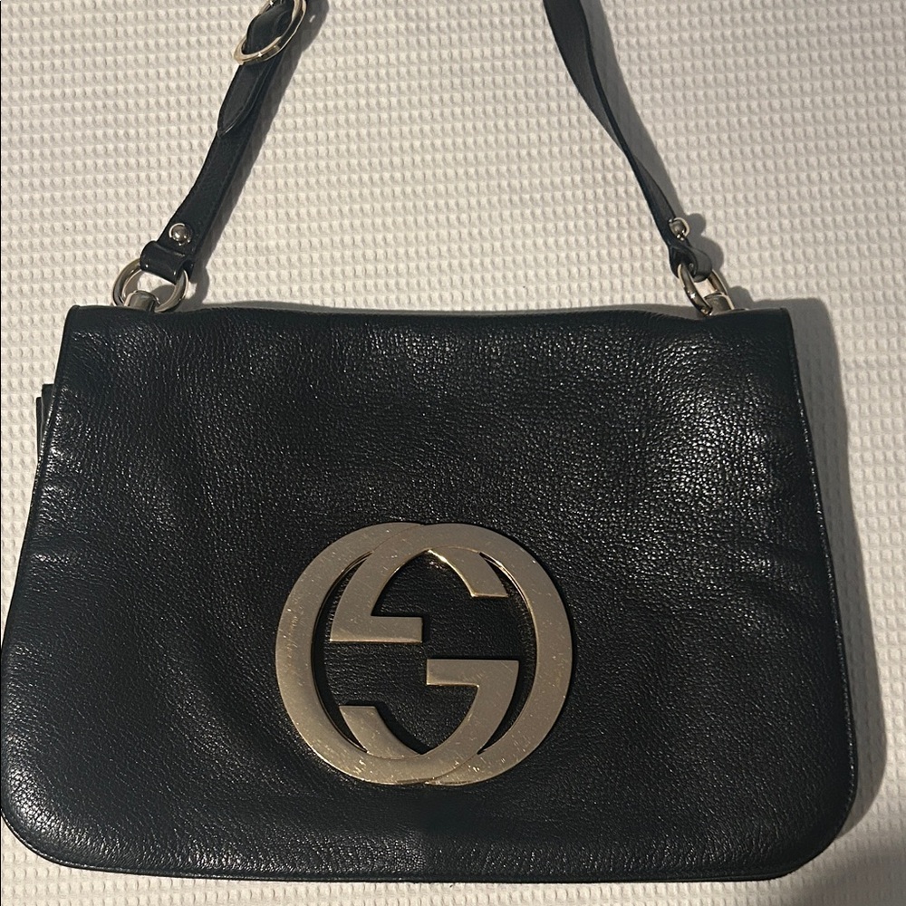 Gucci Black Satchel Bag with Gold Logo.